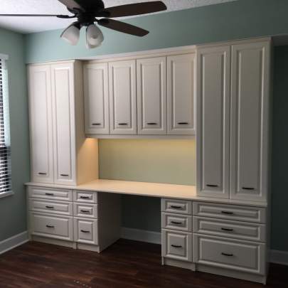 Desk with upper storage and undermount light package